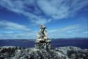 Niungvaliruluit (a window-shaped directional inuksuk for sighting or aligning a location in the…